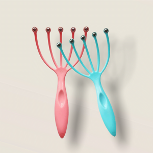 Masajeador de cuero cabelludo forma de mano